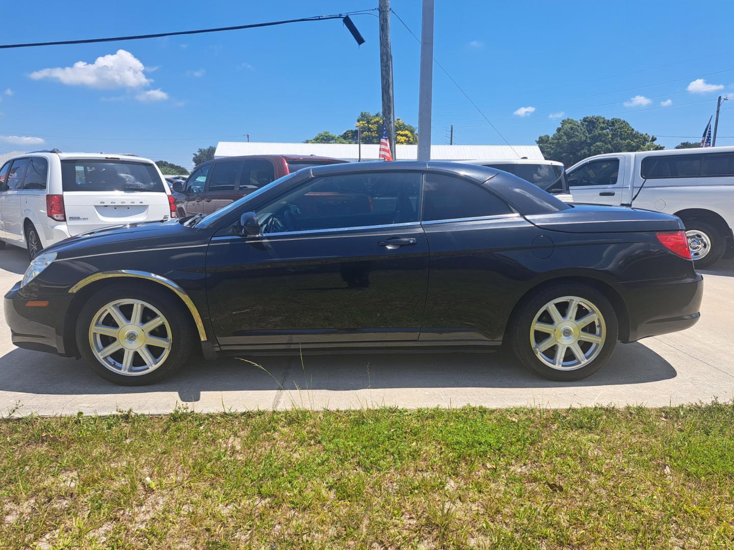 2009 Black Chrysler Sebring (1C3LC55D39N) , located at 1181 Aurora Rd, Melbourne, FL, 32935, (321) 241-1100, 28.132914, -80.639175 - Photo#0